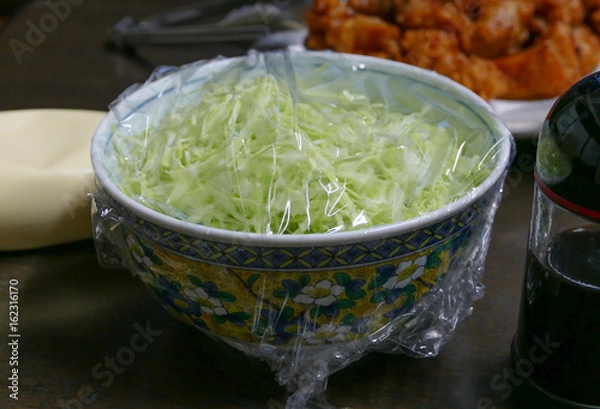 Obraz ラップがかけられたキャベツの千切り