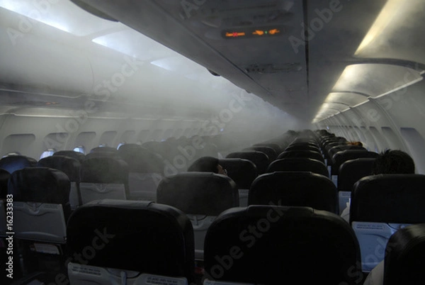 Fototapeta fumée dans l'avion