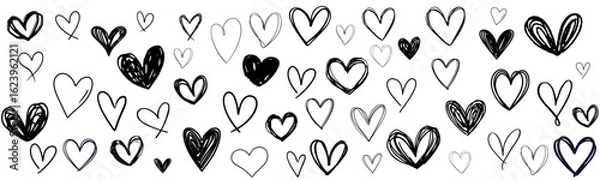 Fototapeta Doodle hearts drawn by hand. Grunge scrawls, chalk scribbles, rough brush strokes, underlines and circles