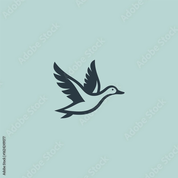 Fototapeta Flying duck logo in smooth and simple silhouette design.