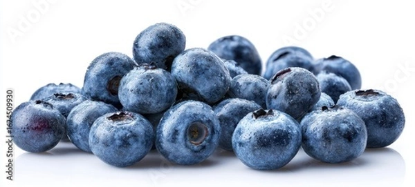 Fototapeta The pile of fresh blueberries ready for culinary delights and healthy snacking.