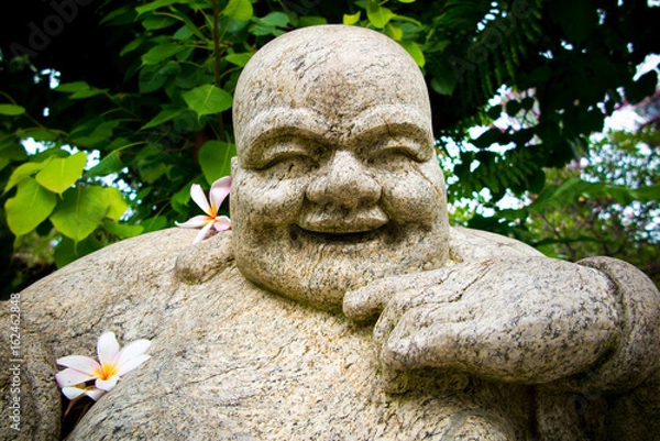 Obraz Statue Covered in Flowers