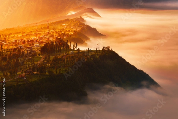 Fototapeta sunrise over the mountains at Cemoro LAwang Bromo Tengger Semeru National Park East Java Indonesia