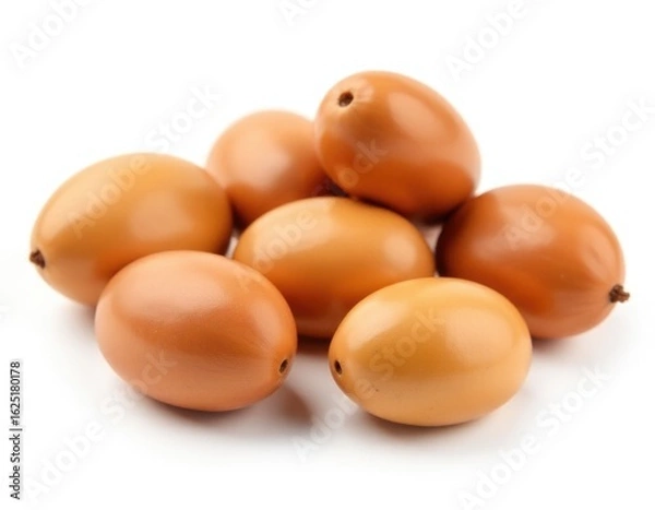 Fototapeta A collection of brown fruits stacked on top of each other, ideal for food and still life photography