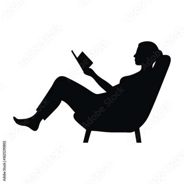 Obraz Silhouette of a woman relaxing and reading a book