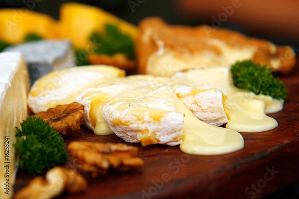 Obraz Cheese plate with melting cheese