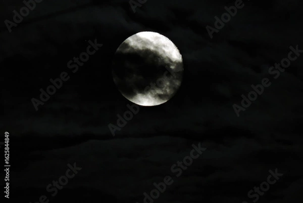 Fototapeta Mysterious full moon in dark clouds