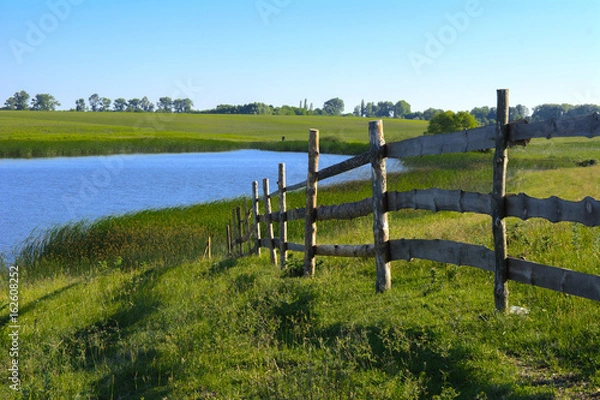 Obraz A beautiful lake for breeding fish. Magnificent view of the lake.
