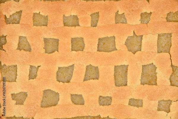 Fototapeta A close-up, full-frame image captures the golden-brown lattice top of a freshly baked apple pie, revealing the soft apple filling beneath