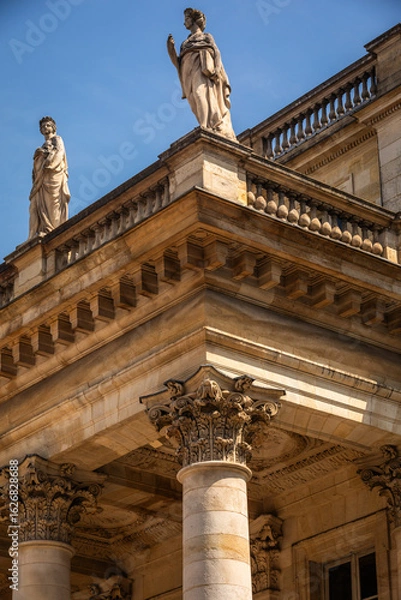 Fototapeta The beautiful Grand Theatre of Bordeaux Building with extensive Decoration, Stone Columns, Plaster, Statues - Close-up