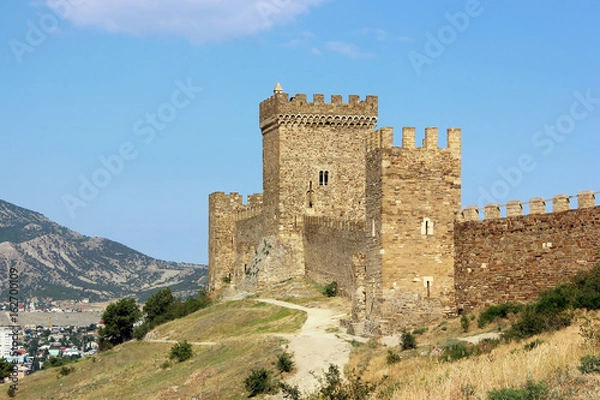 Obraz Medieval fortress overlooking the modern city.