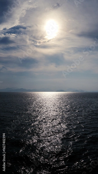 Fototapeta 태양과 구름과 바다 그리고 윤슬