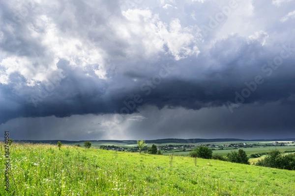 Obraz Approaching summer storm in the field