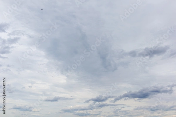 Obraz Overcast sky with scattered gray clouds