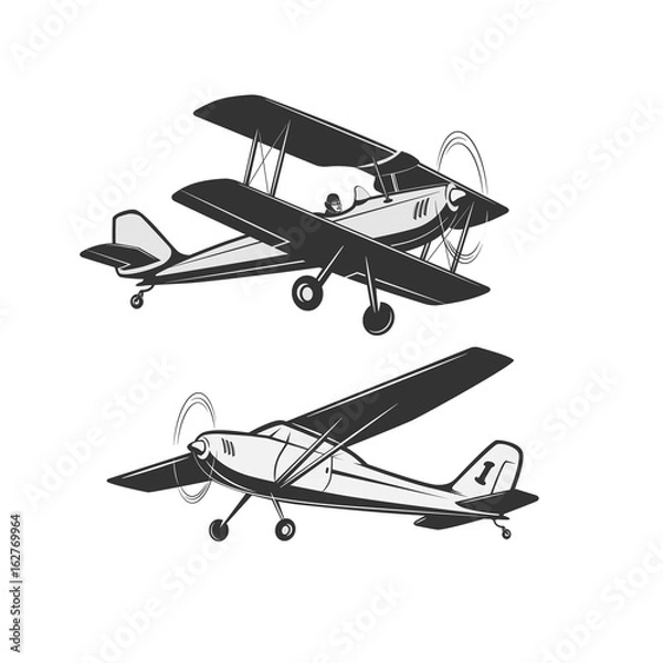 Obraz Sports, excitement and travel around the world in flight.
Two kinds of vintage, small aircraft.
