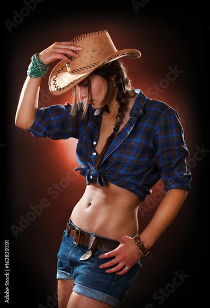 Obraz  cowgirl studio portrait