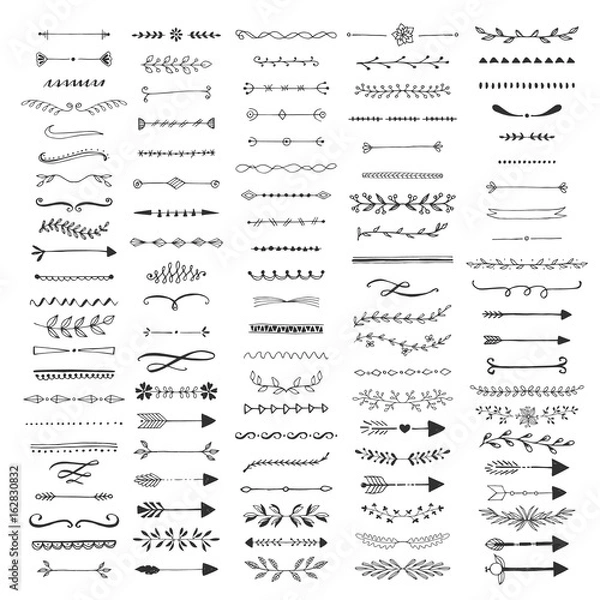 Fototapeta Hand drawn ink dividers and lines. Isolated. Vector.