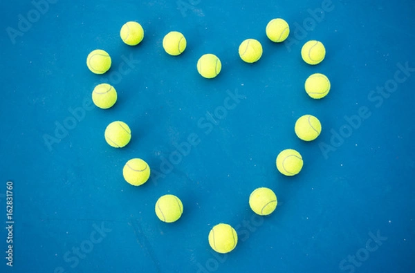 Obraz Tennis is a racket sport that is an Olympic sport and is played at all levels of society and at all ages.