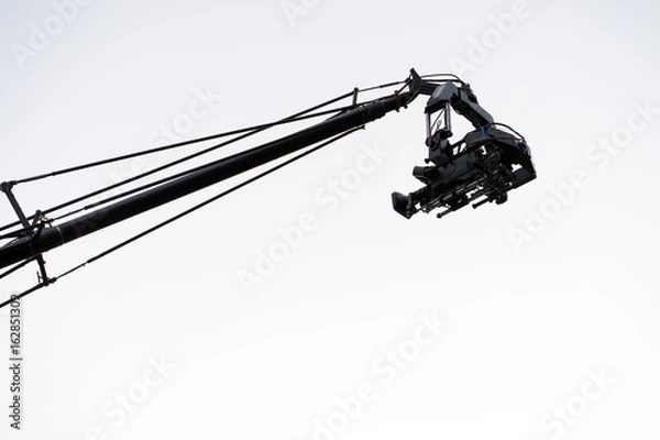Fototapeta Live event video camera on crane over white