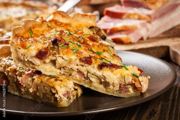 Fototapeta Pieces of quiche lorraine with bacon and cheese
