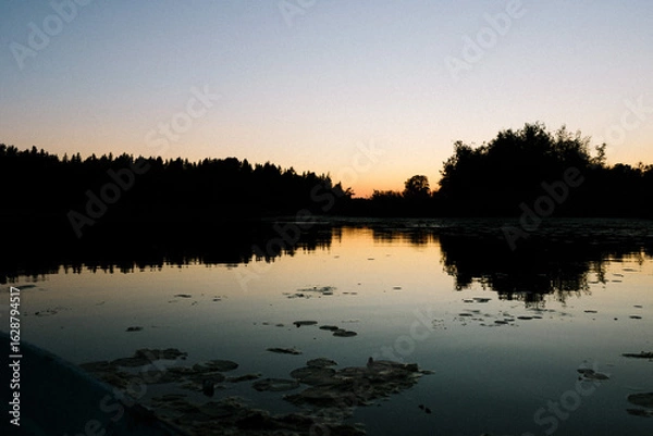 Obraz Sunset over a lake in Sweden