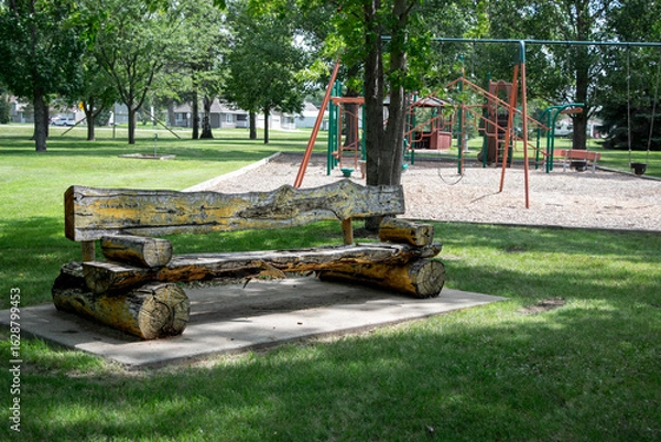 Obraz Rustic Log bench at playground