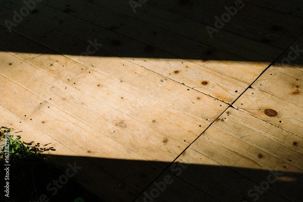 Obraz Hard light on a hardwood floor