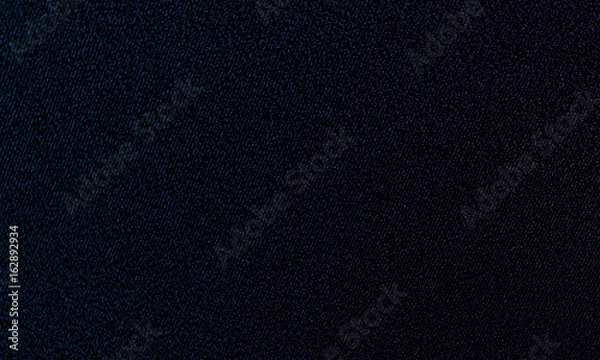 Fototapeta Texture of blue jeans for simple background.