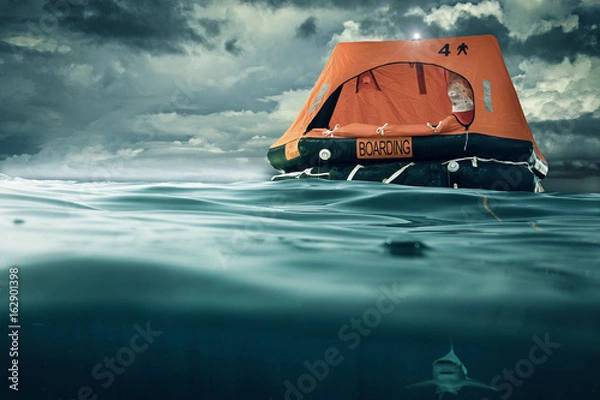 Obraz tratwa ratunkowa unosząca się na morzu