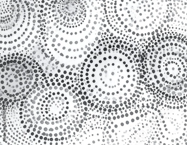 Fototapeta Abstract grayscale pattern of overlapping concentric circles formed by varying sized dots