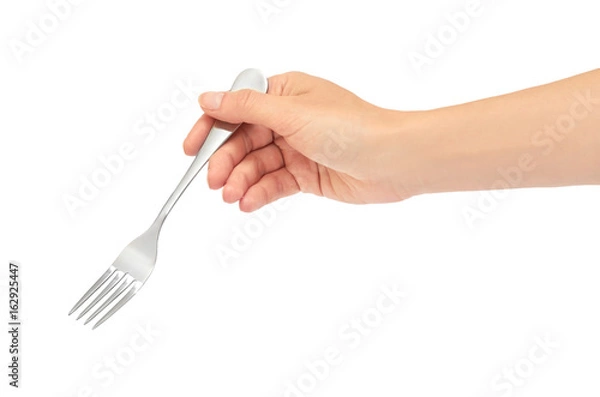 Obraz Female hands hold a fork. Isolated on white background