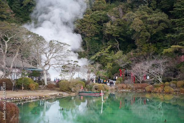 Fototapeta Hot spring water (Hells), the "sea hell" features a pond of boiling and red torii gateway in Umi Jigoku at Beppu, Oita-shi, Kyushu, Japan