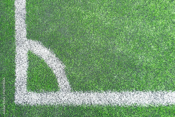 Obraz White corner line on the green football/soccer field from top view for background