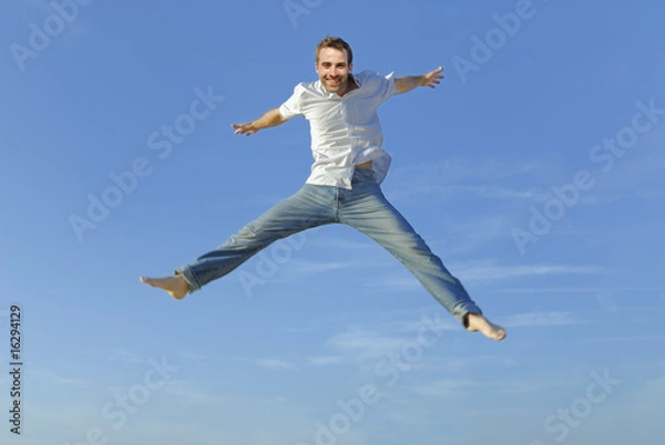 Obraz jeune homme sautant en l'air