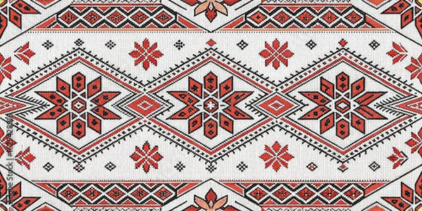 Fototapeta Authentic traditional embroidery pattern featuring geometric motifs and floral elements in red and black