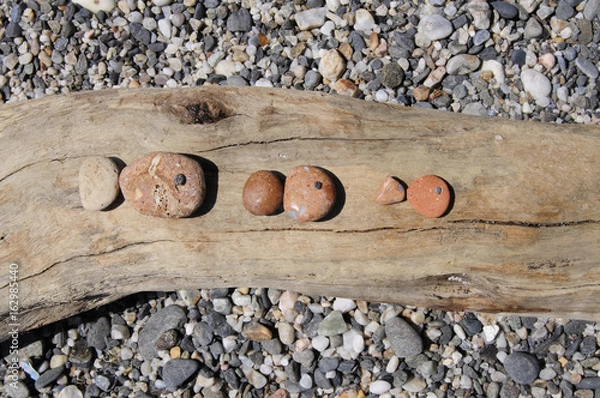 Obraz three stone fishes