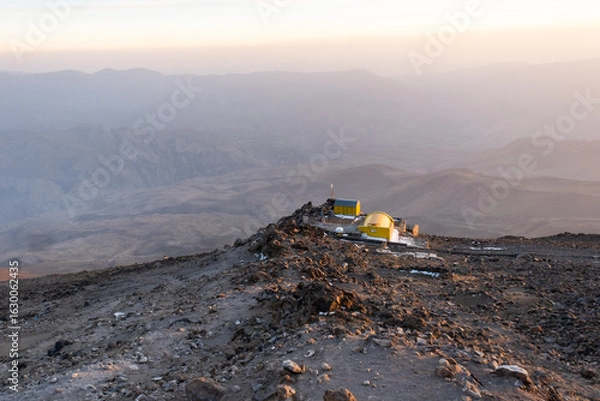 Fototapeta Climbing on volcano Damavand in Elbrus mountain range, view of Camp Bargakh Sevom located at an altitude of 4200 meters above sea level, Iran
