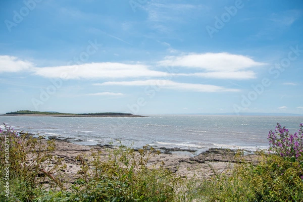 Fototapeta Rocky beach and island
