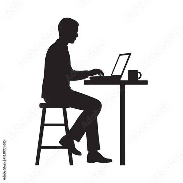 Fototapeta Man working on laptop at a table with coffee silhouette