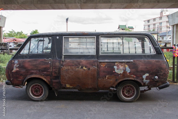 Fototapeta Rusted old van