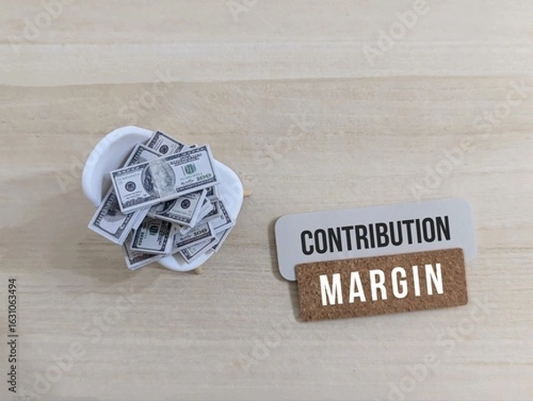 Obraz Contribution Margin and Financial Concept with Dollar Bills