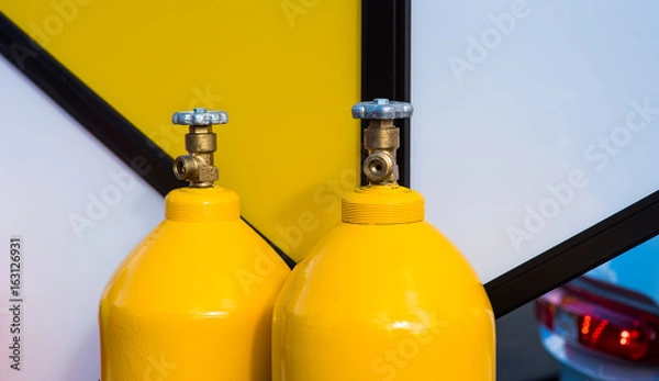 Obraz yellow LPG gas bottles
