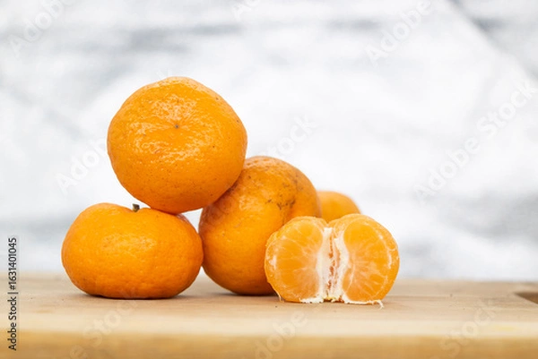 Obraz Ripe Orange or Citrus or tangerina and peeled fruit With clipping path. Full depth of field.