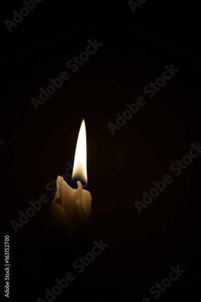 Obraz Candle on the black background 