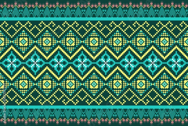 Obraz Modern pixel art meets classic elegance in this unique green and yellow pattern. Pixel art textile design is perfect for fashion backgrounds and cultural themes. Vector art style.