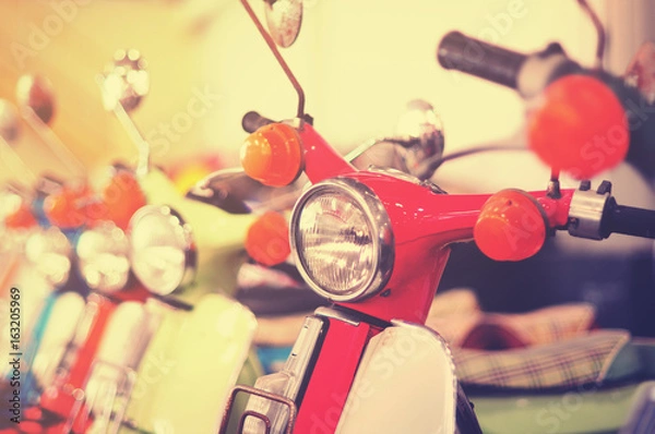 Fototapeta Red vintage motorcycle in retro style tone.