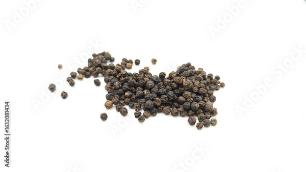 Fototapeta Black pepper on a white background.