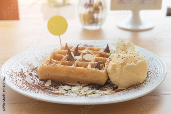 Fototapeta waffles with chocolate sauce and ice cream