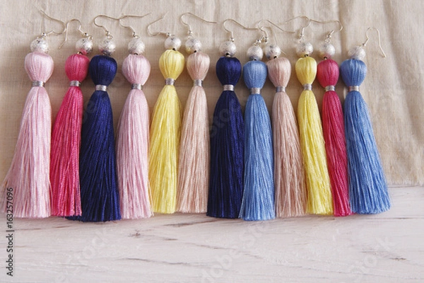 Fototapeta Colorful tassel earrings assortment