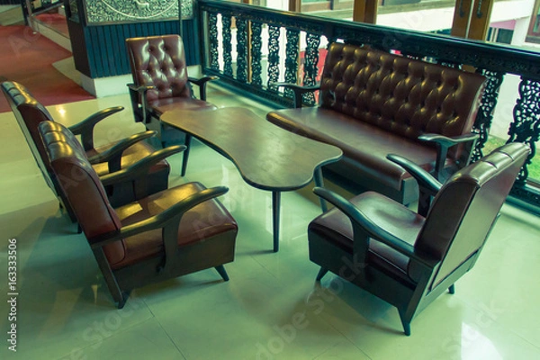 Fototapeta Old leather sofas, living room vintage filter